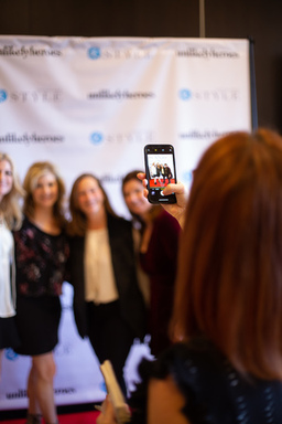 Guests take photos on the step and repeat.jpg
