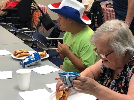 Ability Connection Members eating hot dogs.jpg